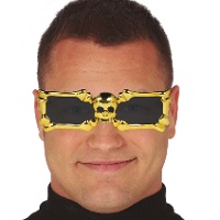 Lunettes à monture dorée avec squelettes