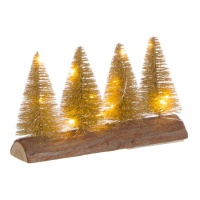 Arbres de Noël avec lumière à la base du tronc