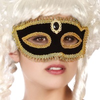 Masque vénitien décoré en noir et or
