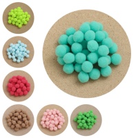 Pompons colorés de 1,5 cm - 40 pièces.