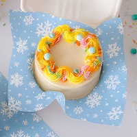 Papier anti-graisse à motif flocons de neige 25 x 25 cm - 50 unités